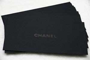 chanel booklet black envelope